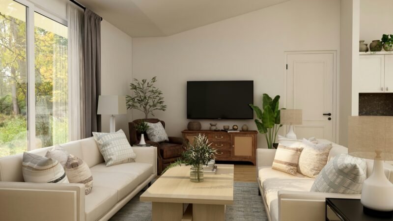 Salon contemporain lumineux avec mobilier beige, décoration naturelle et grandes baies vitrées – architecture d’intérieur à Lyon, tendances 2025
